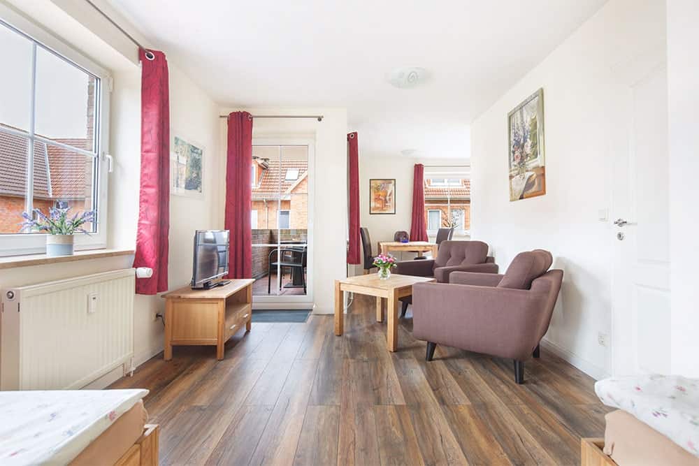 Wohn- und Schlafbereich eines Zimmers in der Pension Schmidt Wohn- und Schlafbereich eines Zimmers in der Pension Schmidt